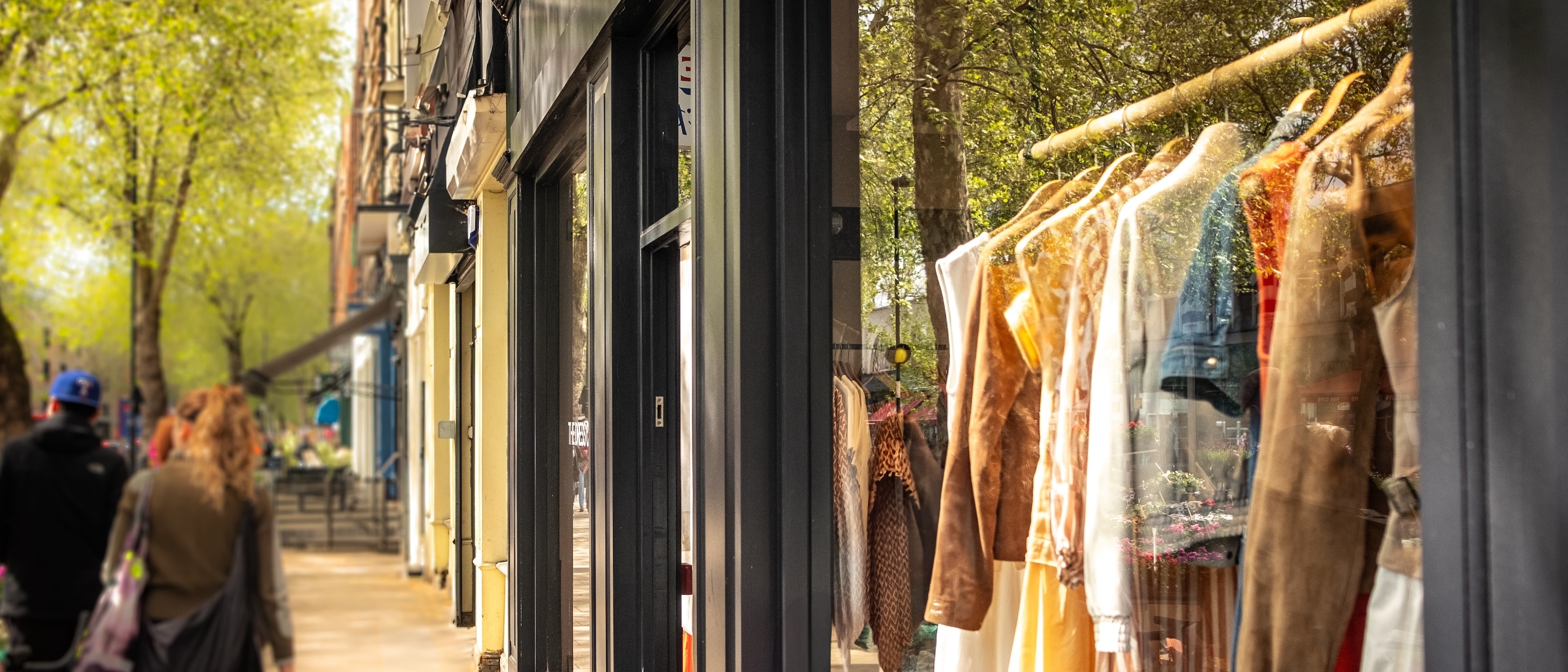 A pedestrian street of shops.